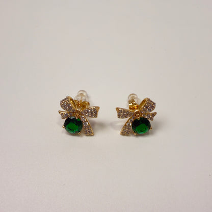 Bow-shaped emerald earrings