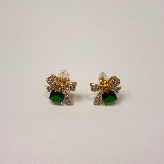 Bow-shaped emerald earrings
