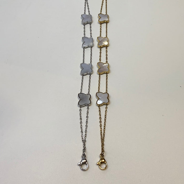 Pulsera de acero inoxidable con mariposa dorada y nácar