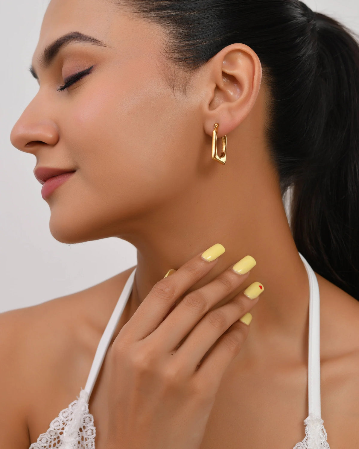 gold u-shaped earrings